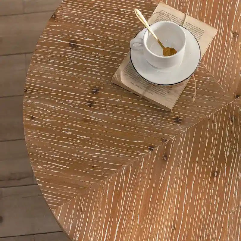 Table basse ronde au style rétro moderne, avec un design minimaliste.