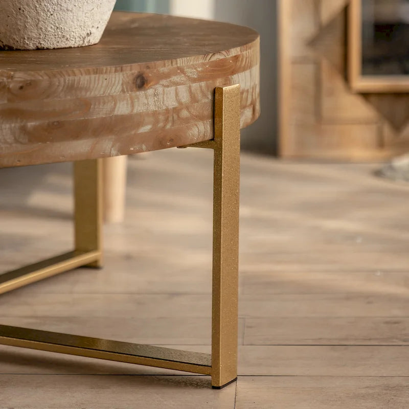 Table basse ronde au style rétro moderne, avec un design minimaliste.